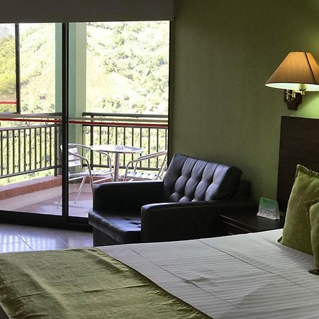莫拉莱斯国际酒店及会议中心 Ibagué 外观 照片 A room at the hotel