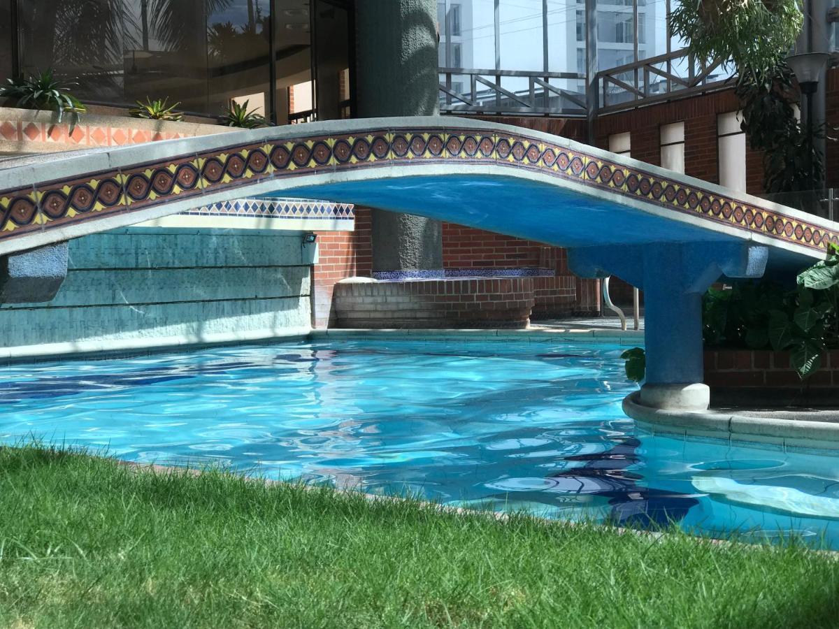 莫拉莱斯国际酒店及会议中心 Ibagué 外观 照片 The swimming pool