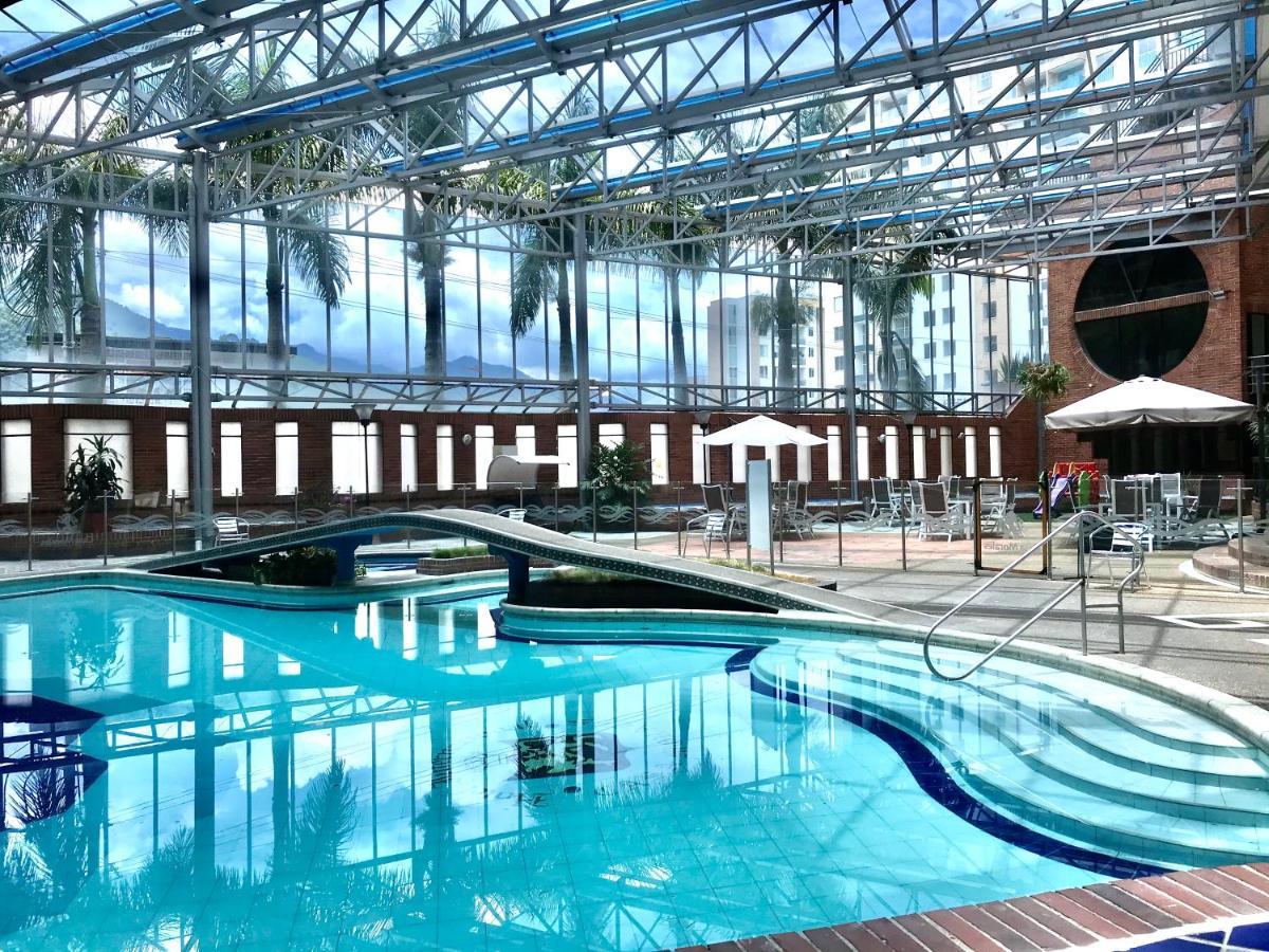 莫拉莱斯国际酒店及会议中心 Ibagué 外观 照片 The swimming pool at the hotel