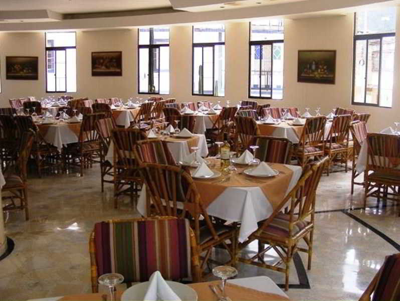 莫拉莱斯国际酒店及会议中心 Ibagué 外观 照片 The dining room at the hotel