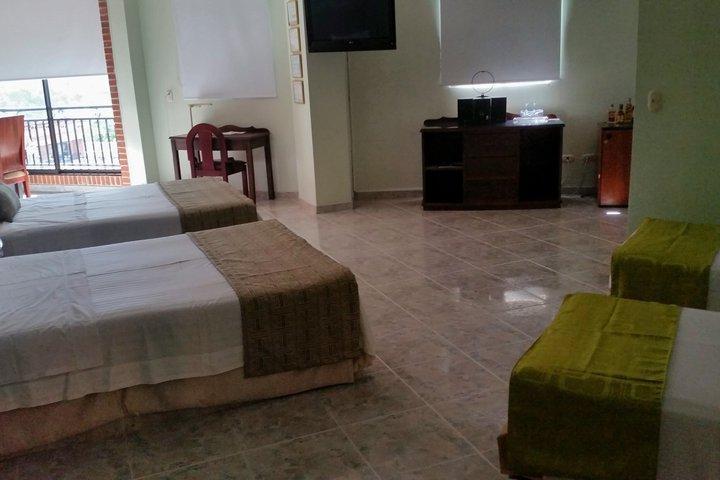 莫拉莱斯国际酒店及会议中心 Ibagué 外观 照片 A room at the hotel