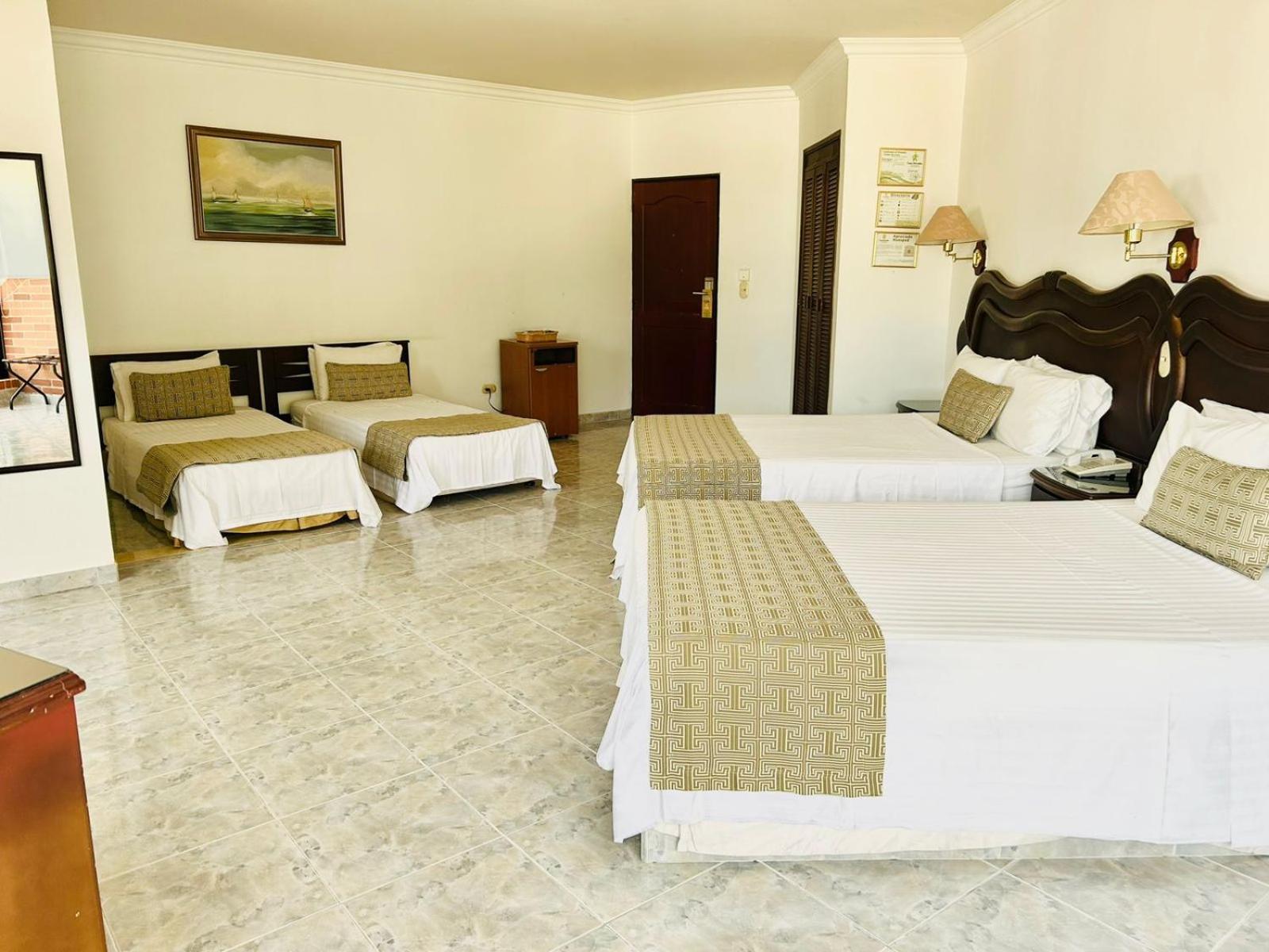 莫拉莱斯国际酒店及会议中心 Ibagué 外观 照片 A room at the hotel