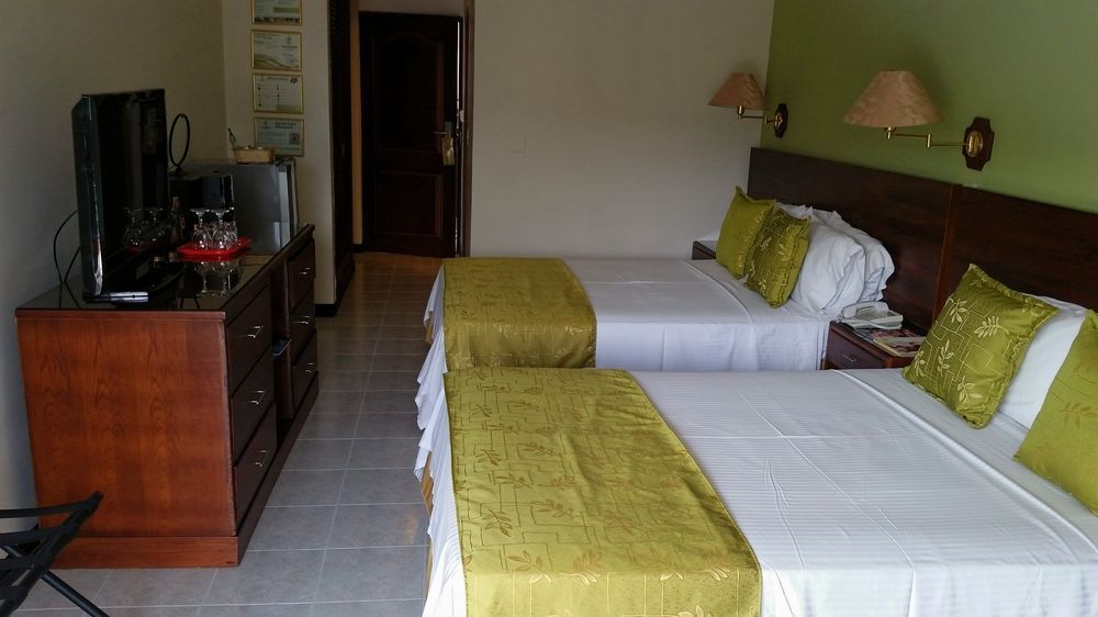 莫拉莱斯国际酒店及会议中心 Ibagué 外观 照片 A room at the hotel